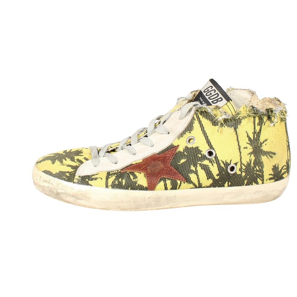 Golden Goose Deluxe Brand yellow canvas distressed high-top Francy trainers.